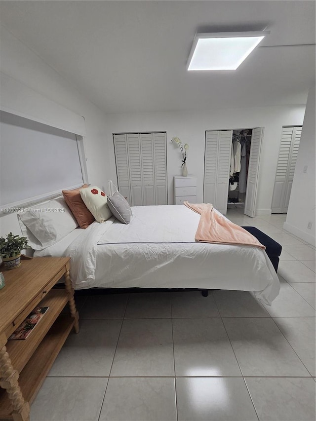 620 NE 12th Ave Unit 101, Hallandale Beach, FL 33009 - tiled bedroom with multiple closets