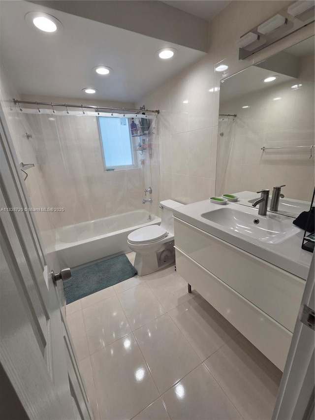 620 NE 12th Ave Unit 101, Hallandale Beach, FL 33009 - full bathroom with shower / tub combo, tile patterned flooring, vanity, and recessed lighting