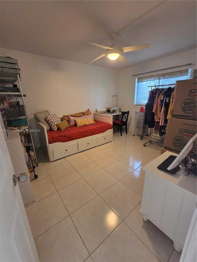 620 NE 12th Ave Unit 101, Hallandale Beach, FL 33009 - bedroom featuring light tile patterned flooring and ceiling fan