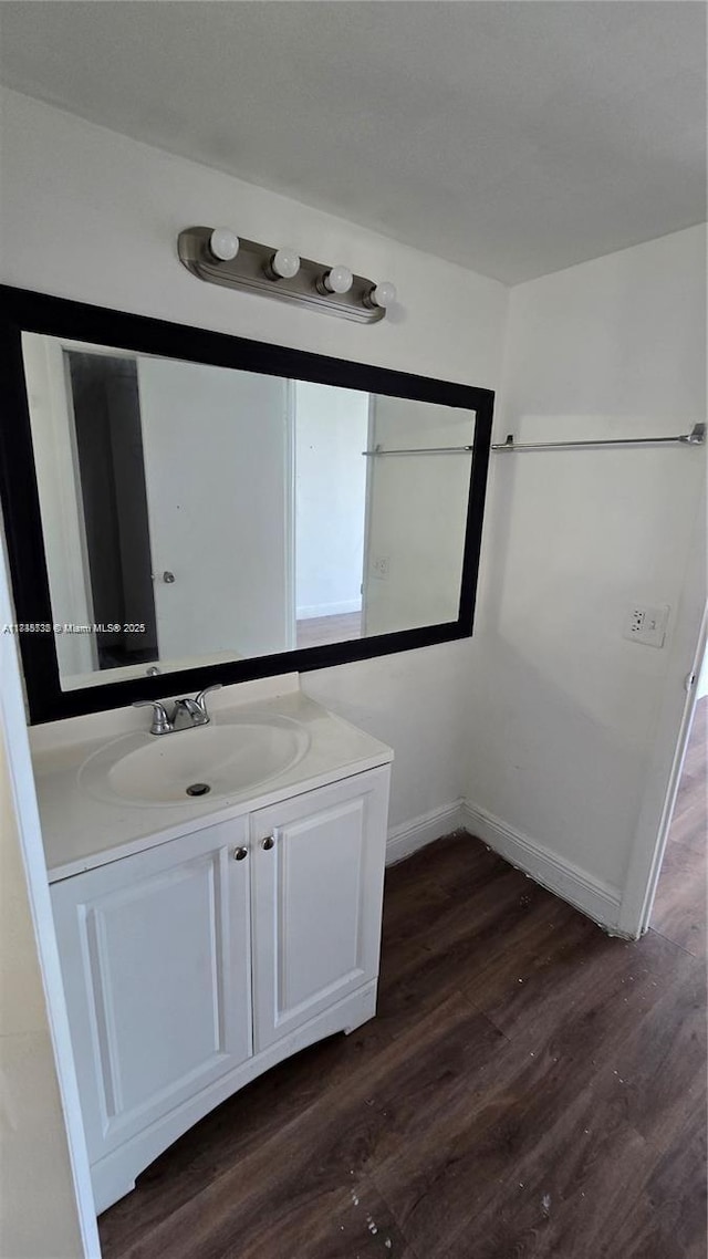 498 NW 165th St Rd Unit D-407, Miami, FL 33169 - bathroom featuring vanity and wood finished floors