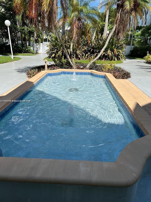 498 NW 165th St Rd Unit D-407, Miami, FL 33169 - view of outdoor pool