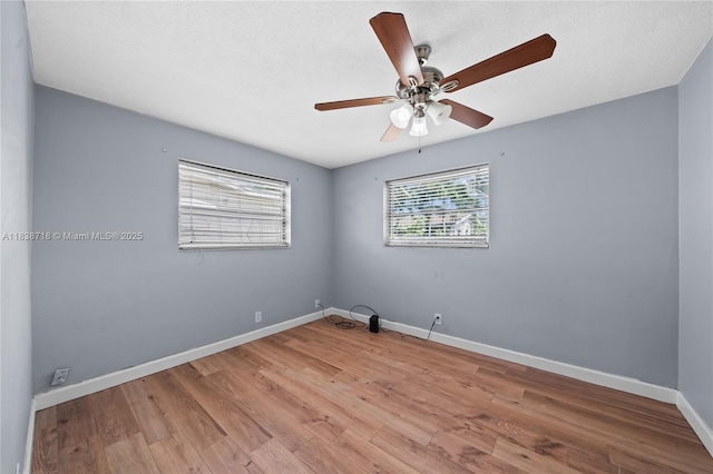 4938 NW 54th Ct, Tamarac, FL 33319 - empty room featuring wood finished floors and a ceiling fan