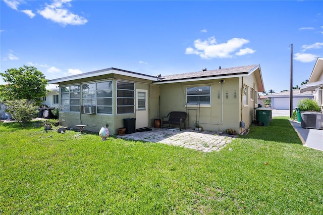 4938 NW 54th Ct, Tamarac, FL 33319 - rear view of house featuring a patio area, stucco siding, a lawn, and cooling unit