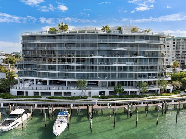1135 103rd St Unit 702, Bay Harbor Islands, FL 33154 - view of apartment building / complex featuring a water view