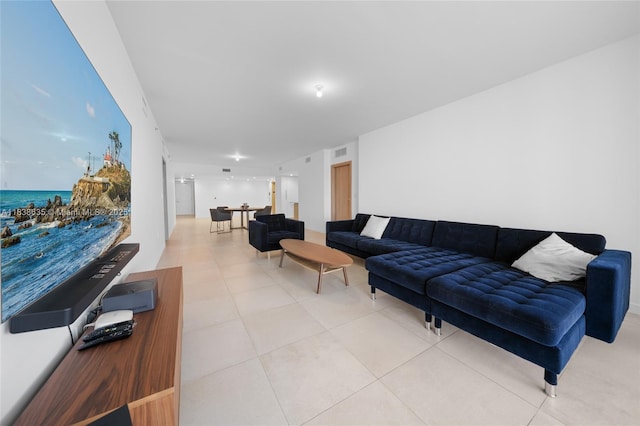 1135 103rd St Unit 702, Bay Harbor Islands, FL 33154 - living area featuring light tile patterned floors