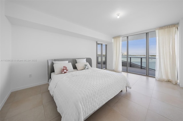 1135 103rd St Unit 702, Bay Harbor Islands, FL 33154 - tiled bedroom with a water view, access to outside, and a wall of windows
