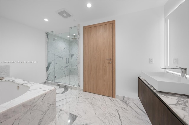 1135 103rd St Unit 702, Bay Harbor Islands, FL 33154 - bathroom with a marble finish shower, a bath, vanity, and recessed lighting