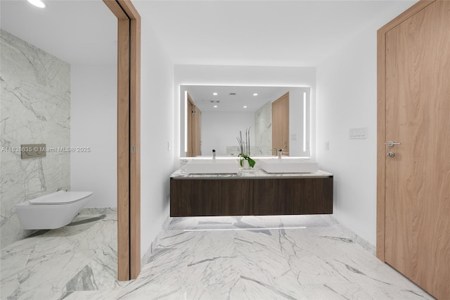 1135 103rd St Unit 702, Bay Harbor Islands, FL 33154 - bathroom with marble tiled flooring, double vanity, and recessed lighting