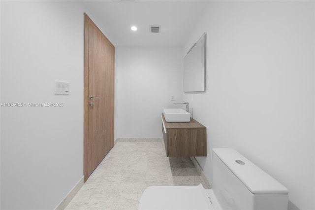 1135 103rd St Unit 702, Bay Harbor Islands, FL 33154 - bathroom with vanity and recessed lighting