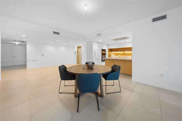 1135 103rd St Unit 702, Bay Harbor Islands, FL 33154 - dining room featuring recessed lighting and light tile patterned floors