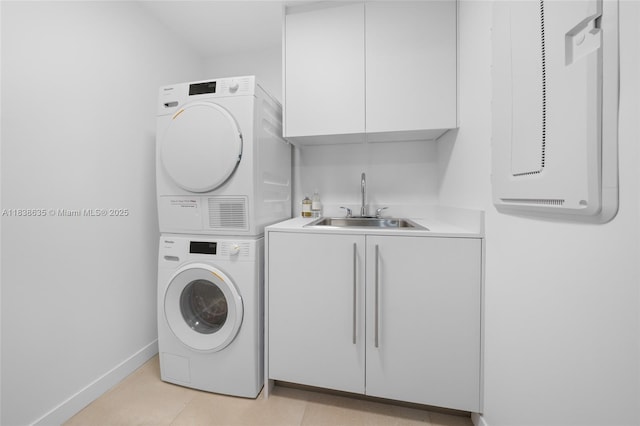 1135 103rd St Unit 702, Bay Harbor Islands, FL 33154 - washroom with stacked washer / dryer, cabinet space, and wet bar
