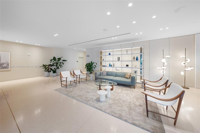 1135 103rd St Unit 702, Bay Harbor Islands, FL 33154 - living area featuring finished concrete flooring and recessed lighting