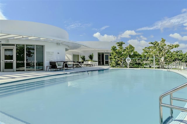 1135 103rd St Unit 702, Bay Harbor Islands, FL 33154 - community pool with a patio