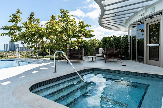 1135 103rd St Unit 702, Bay Harbor Islands, FL 33154 - swimming pool with a patio
