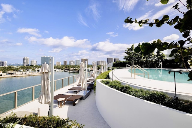 1135 103rd St Unit 702, Bay Harbor Islands, FL 33154 - community pool featuring a view of city and a water view