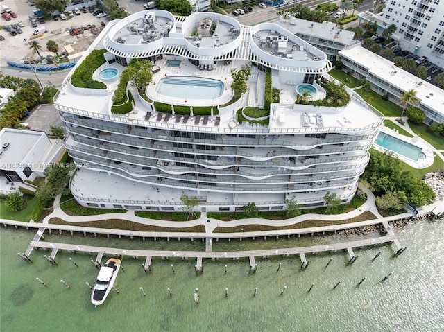 1135 103rd St Unit 702, Bay Harbor Islands, FL 33154 - aerial view of a pool area and a nearby body of water