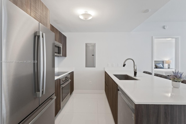 488 NE 18th St Unit 509, Miami, FL 33132 - kitchen featuring modern cabinets, appliances with stainless steel finishes, light countertops, and a peninsula