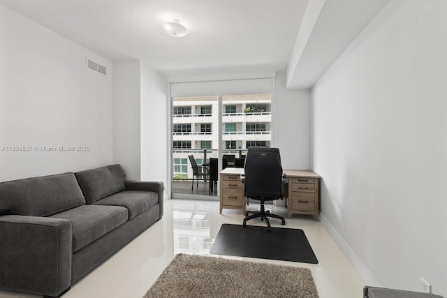488 NE 18th St Unit 509, Miami, FL 33132 - home office with expansive windows and a textured ceiling