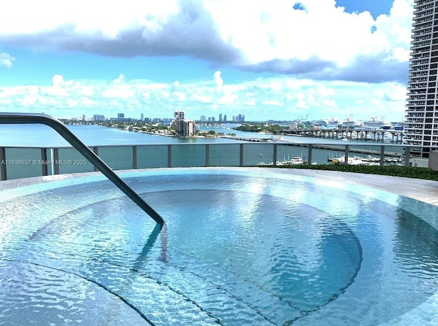 488 NE 18th St Unit 509, Miami, FL 33132 - view of swimming pool featuring a view of skyline and a water view