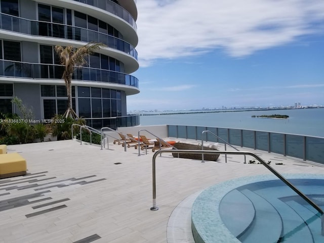 488 NE 18th St Unit 509, Miami, FL 33132 - view of swimming pool featuring a water view