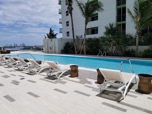 488 NE 18th St Unit 509, Miami, FL 33132 - community pool featuring a view of skyline and a patio area