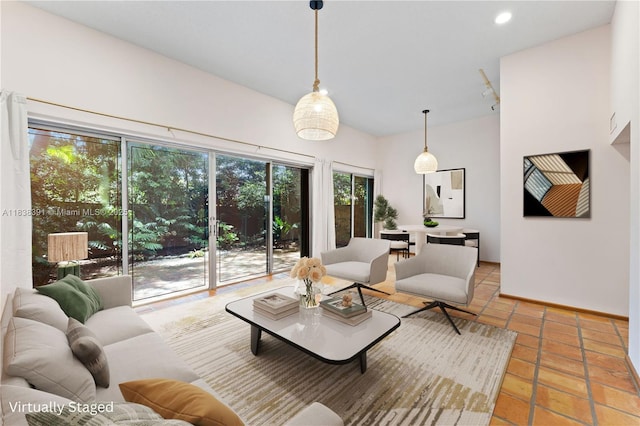 2794 SW 22nd Ave, Miami, FL 33133 - living room featuring tile patterned flooring, rail lighting, and recessed lighting