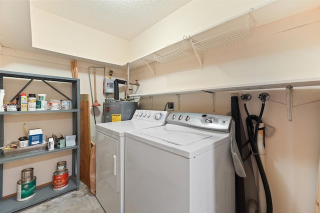 2794 SW 22nd Ave, Miami, FL 33133 - washroom with washing machine and clothes dryer, electric water heater, and a textured ceiling