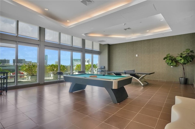 1111 SW 1st Ave Unit 2823-N, Miami, FL 33130 - recreation room featuring a raised ceiling, wallpapered walls, tile patterned flooring, billiards, and expansive windows