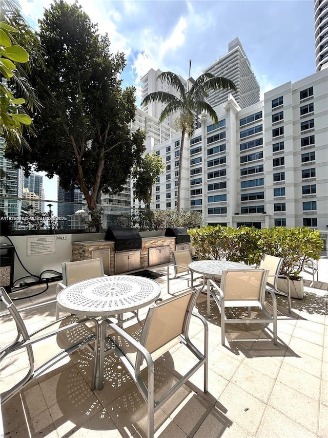 1111 SW 1st Ave Unit 2823-N, Miami, FL 33130 - view of patio / terrace featuring grilling area and outdoor dining area
