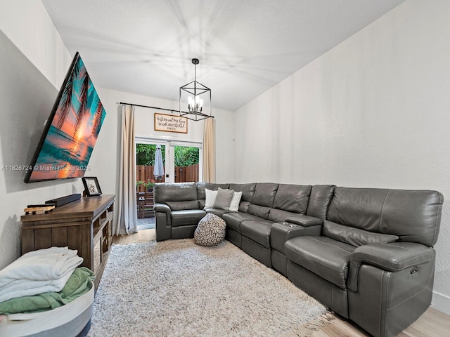 11901 SW 150th Pl, Miami, FL 33196 - living area with light wood finished floors and a chandelier