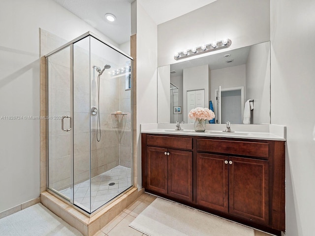 11901 SW 150th Pl, Miami, FL 33196 - full bathroom with double vanity, a shower stall, and tile patterned floors