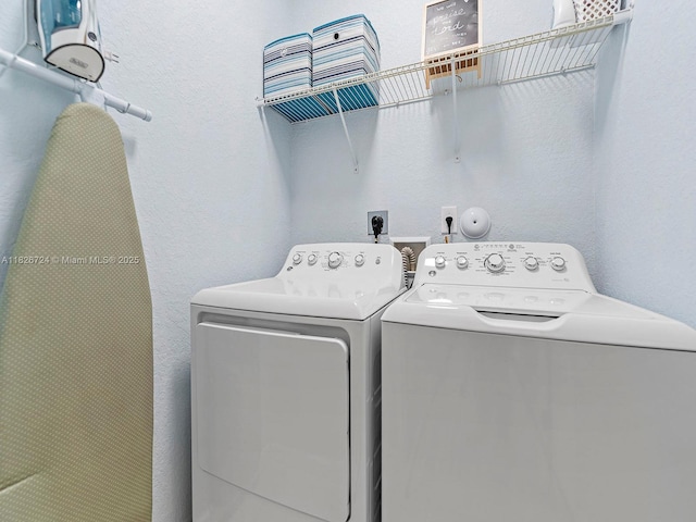 11901 SW 150th Pl, Miami, FL 33196 - washroom with washer and dryer and a textured wall