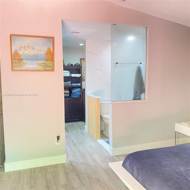 20317 SW 86th Ct, Cutler Bay, FL 33189 - bedroom featuring wood tiled floors and ensuite bath