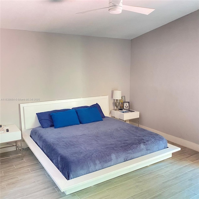 20317 SW 86th Ct, Cutler Bay, FL 33189 - bedroom with wood finished floors and a ceiling fan