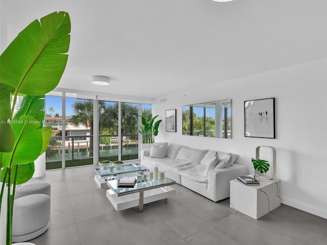 9940 W Bay Harbor Dr Unit 3G-S, Bay Harbor Islands, FL 33154 - living room with a water view and tile patterned flooring