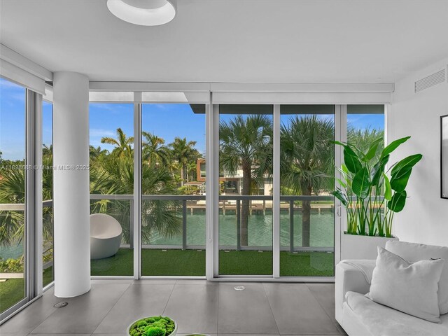 9940 W Bay Harbor Dr Unit 3G-S, Bay Harbor Islands, FL 33154 - sunroom / solarium with plenty of natural light and a water view