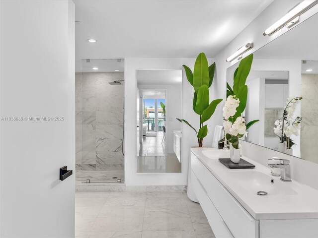 9940 W Bay Harbor Dr Unit 3G-S, Bay Harbor Islands, FL 33154 - bathroom with marble finish flooring, double vanity, a marble finish shower, recessed lighting, and french doors