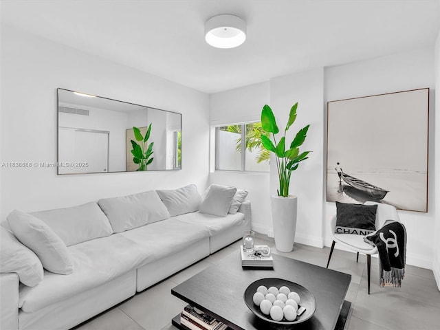 9940 W Bay Harbor Dr Unit 3G-S, Bay Harbor Islands, FL 33154 - living room featuring baseboards