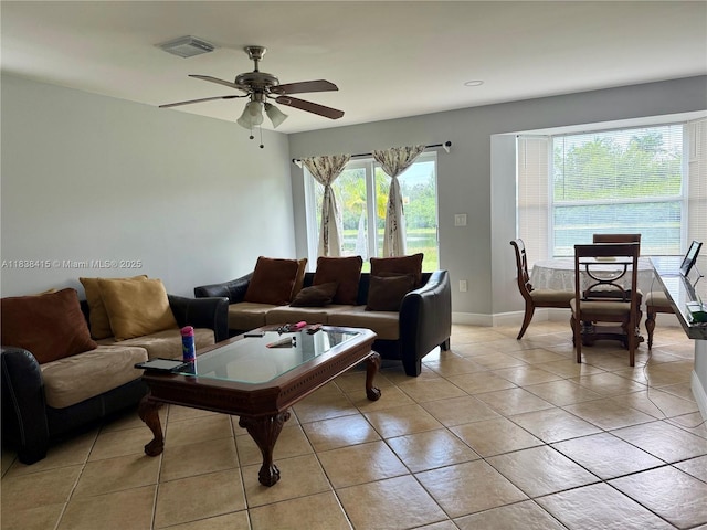 1111 NW 173rd Ave, Pembroke Pines, FL 33029 - living area with a ceiling fan and light tile patterned floors