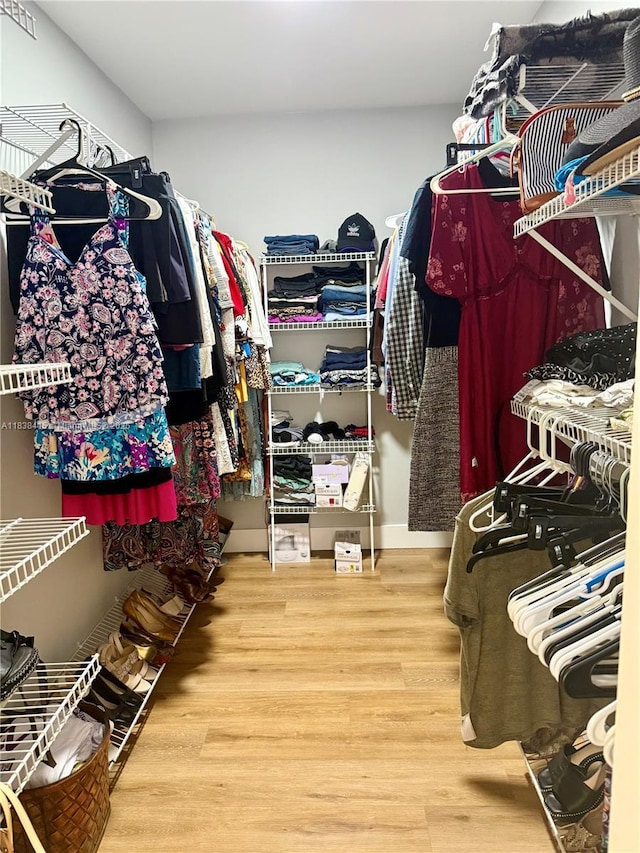 1111 NW 173rd Ave, Pembroke Pines, FL 33029 - walk in closet with wood finished floors