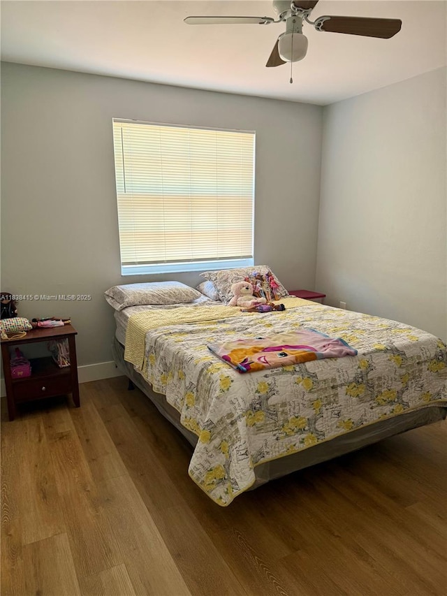1111 NW 173rd Ave, Pembroke Pines, FL 33029 - bedroom with wood finished floors and a ceiling fan