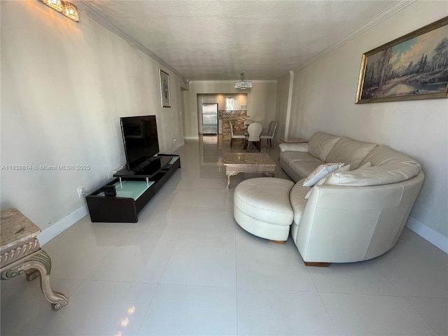 19390 Collins Ave Unit 902, Sunny Isles Beach, FL 33160 - living room with crown molding and baseboards