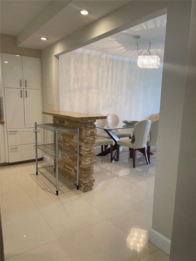 19390 Collins Ave Unit 902, Sunny Isles Beach, FL 33160 - dining space with light tile patterned floors, recessed lighting, and a chandelier