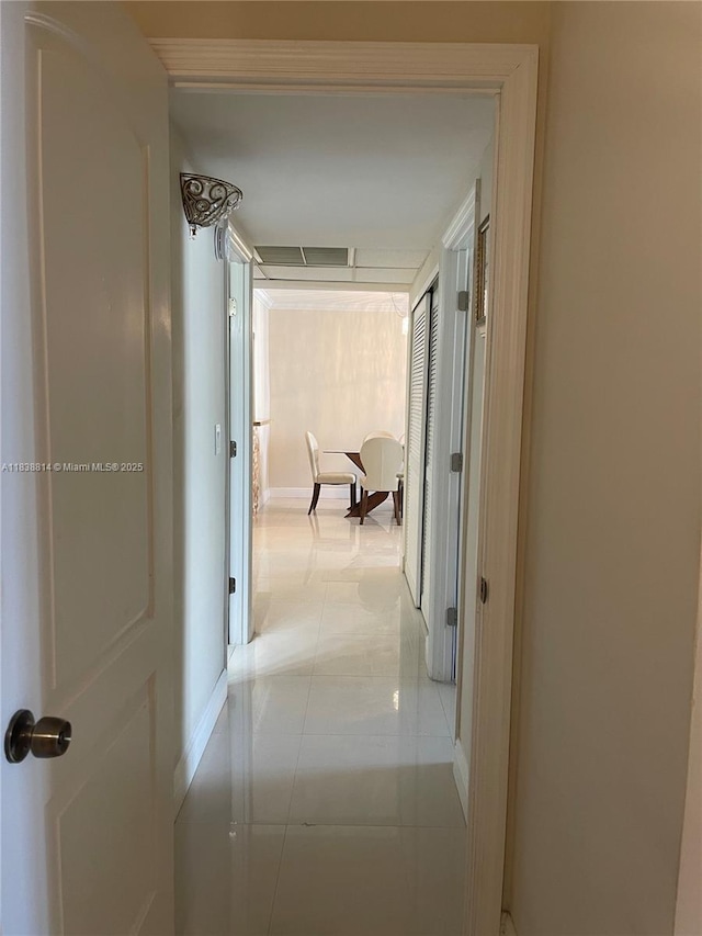 19390 Collins Ave Unit 902, Sunny Isles Beach, FL 33160 - hall featuring baseboards and light tile patterned flooring