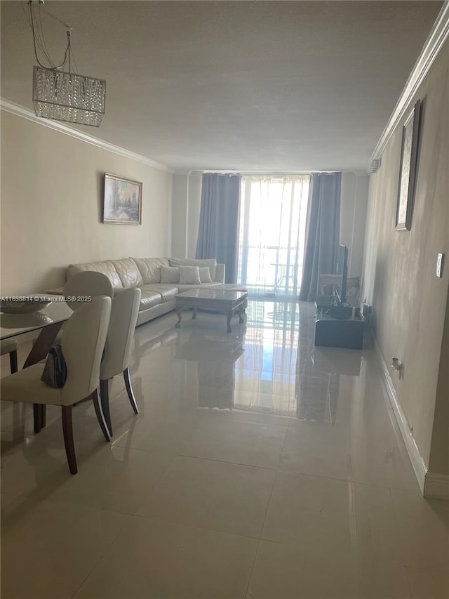 19390 Collins Ave Unit 902, Sunny Isles Beach, FL 33160 - living room with crown molding, healthy amount of natural light, floor to ceiling windows, and tile patterned flooring