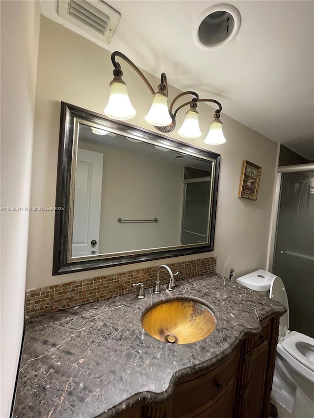 19390 Collins Ave Unit 902, Sunny Isles Beach, FL 33160 - bathroom featuring vanity, a stall shower, and backsplash