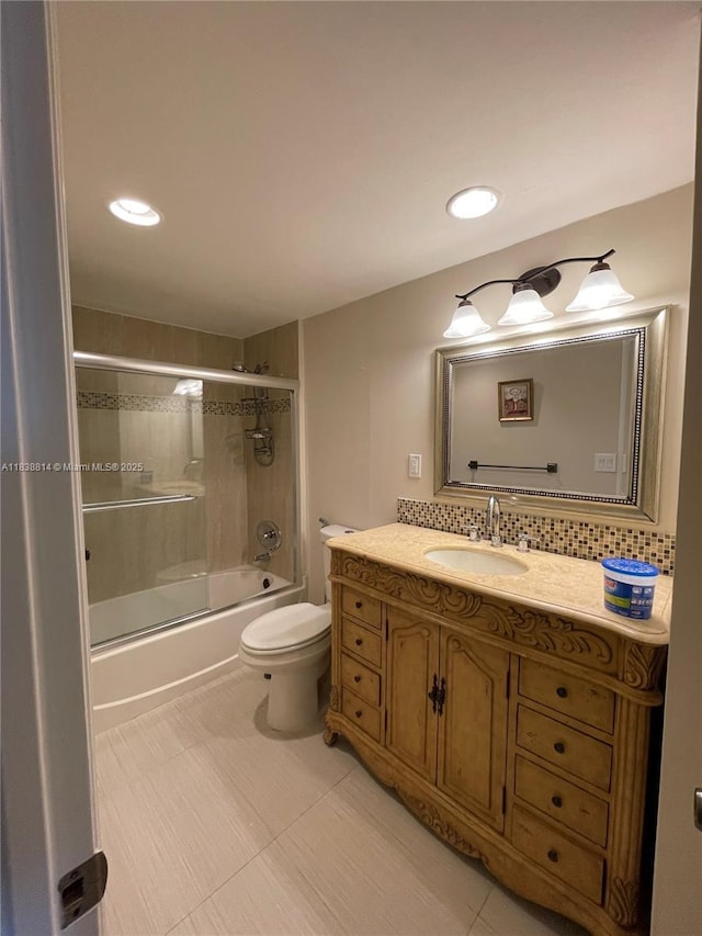 19390 Collins Ave Unit 902, Sunny Isles Beach, FL 33160 - bathroom featuring vanity, shower / bath combination with glass door, decorative backsplash, and recessed lighting