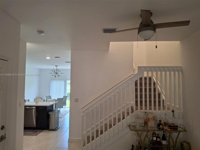 5990 Mustang Mnr, Davie, FL 33314 - stairs featuring ceiling fan, tile patterned flooring, and a chandelier