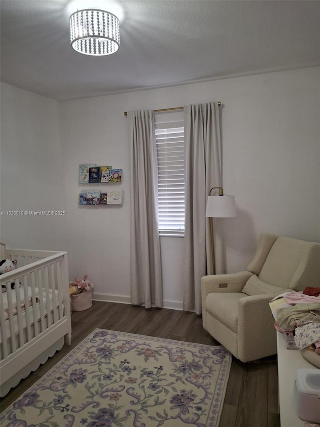 5990 Mustang Mnr, Davie, FL 33314 - bedroom with wood finished floors and a nursery area