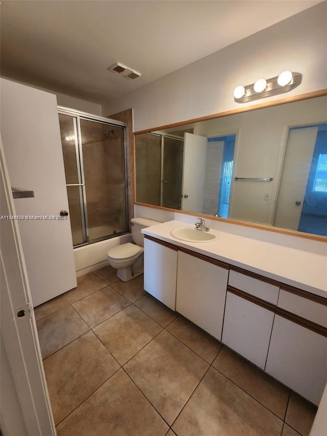 660 Cypress Club Way Unit F11, Deerfield Beach, FL 33064 - bathroom with vanity, bath / shower combo with glass door, and tile patterned flooring